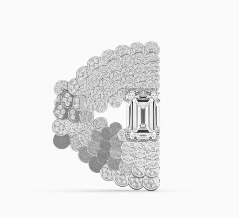 White gold brooch with emerald-cut diamonds Core